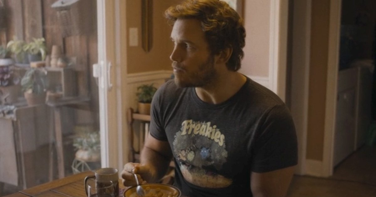 Peter Quill/Star-Lord (Chris Pratt) eats breakfast cereal at his grandfather’s kitchen table in a scene from Guardians of the Galaxy Vol. 3