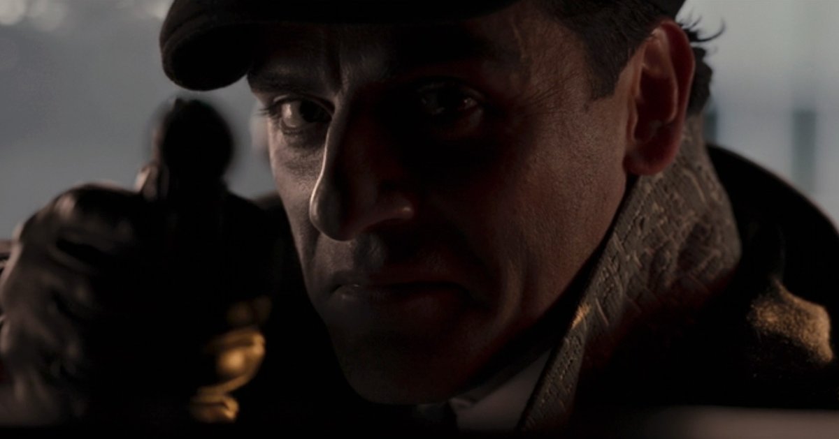 Jake Lockley (Oscar Isaac) points a gun from the driver’s seat of a limousine in the final shot of Moon Knight